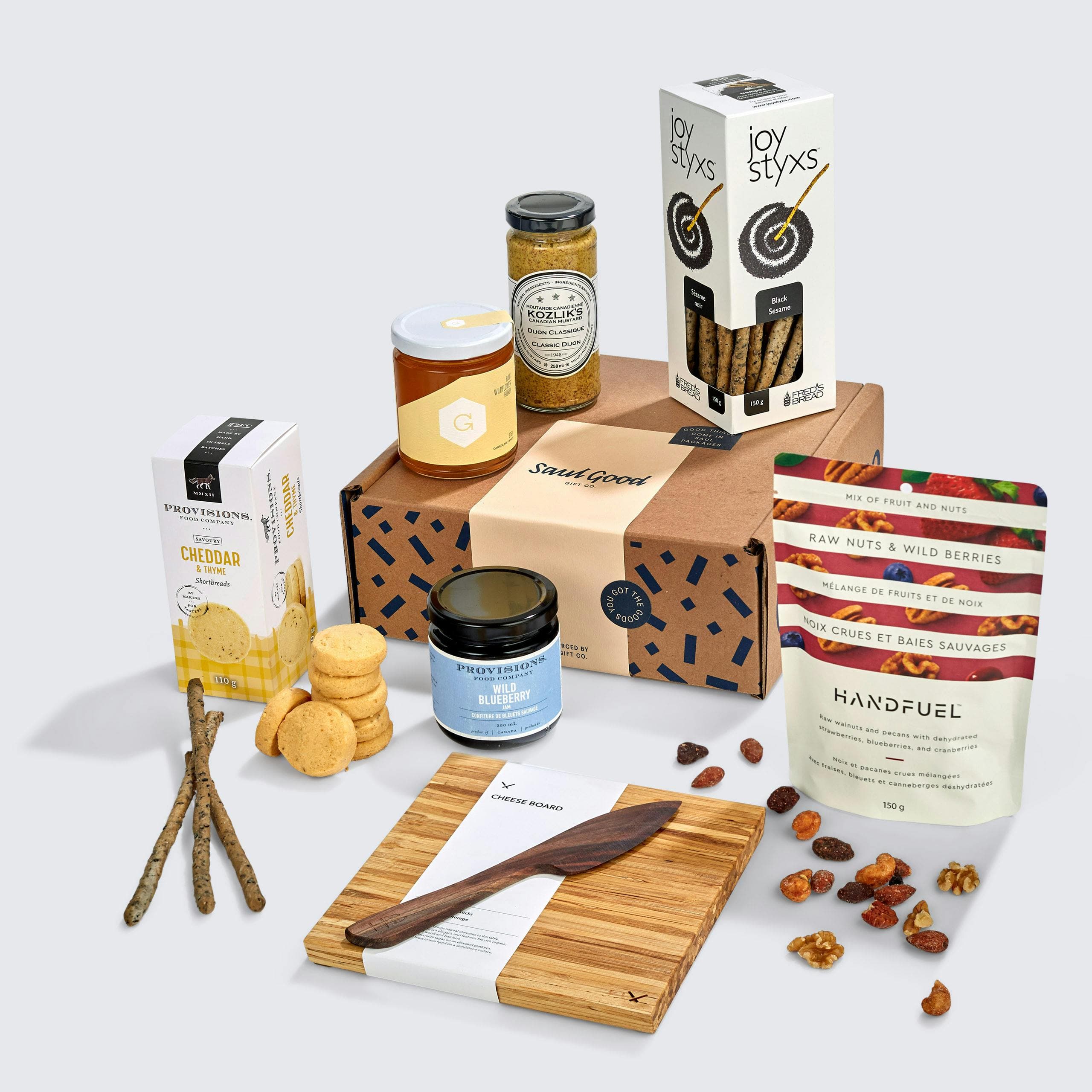 Charcuterie gift with items for making a charcuterie board