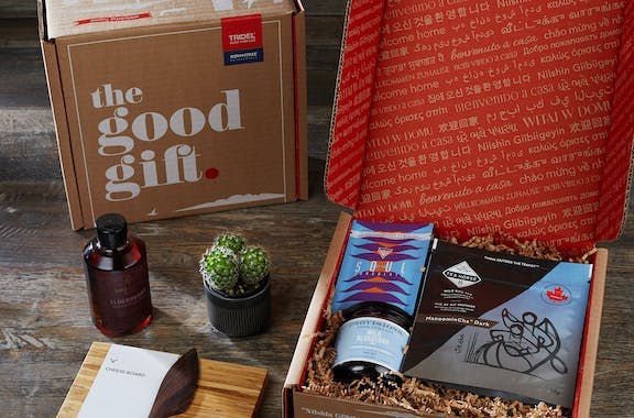 Curated gift box full of breakfast goodies for custom corporate gift program